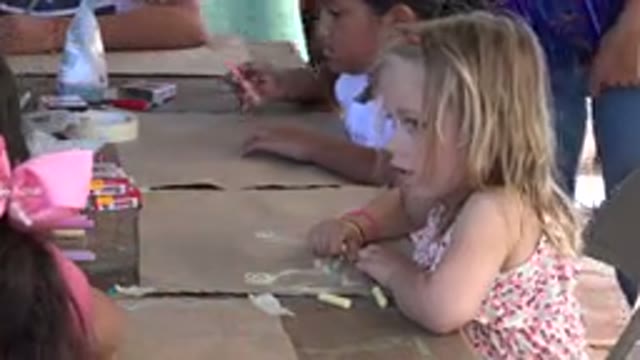 LOS CABOS MEXICO-2019: Kids Drawing With Chalk During Class While Teachers Watch