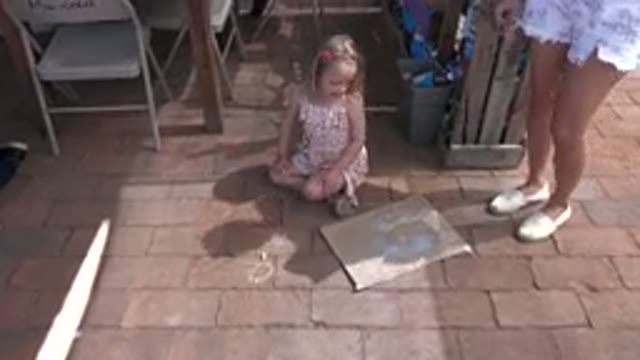 LOS CABOS MEXICO-2019: Child With Woman Painting