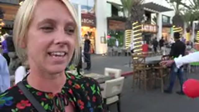 LOS CABOS MEXICO-2019: White Woman Interviewed While Man Behind Her Tries To