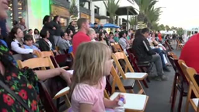 LOS CABOS MEXICO-2019: Young Girl Trying To See What's Happening Over There