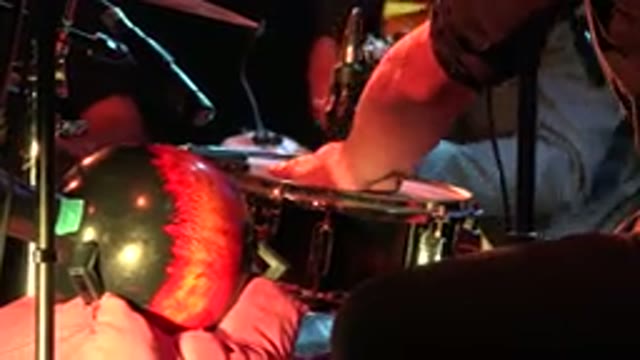 LOS CABOS MEXICO-2019: Man Playing Drums Song With Other Group Members In A