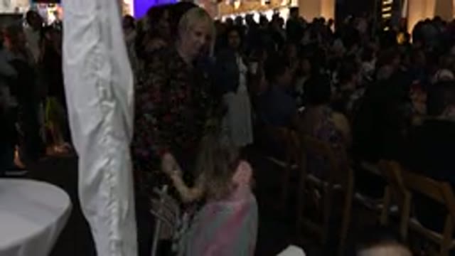 LOS CABOS MEXICO-2019: Mom And Her Little Daughter Attend A Party