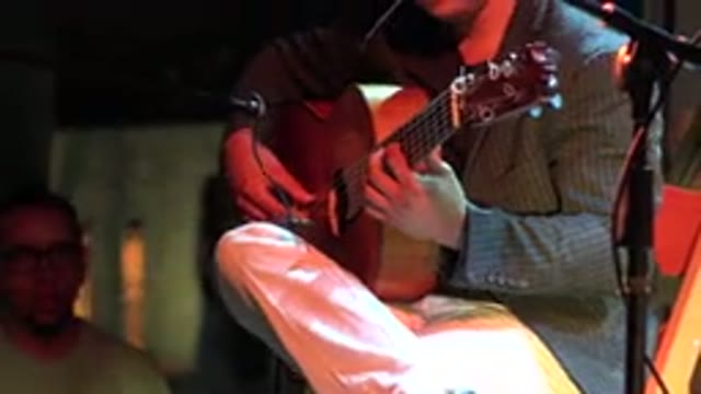 LOS CABOS MEXICO-2019: Man Playing A Classical Guitar On Stage With Two
