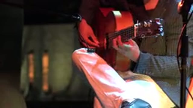 LOS CABOS MEXICO-2019: Suit Dressed Guy Playing Guitar At House Show