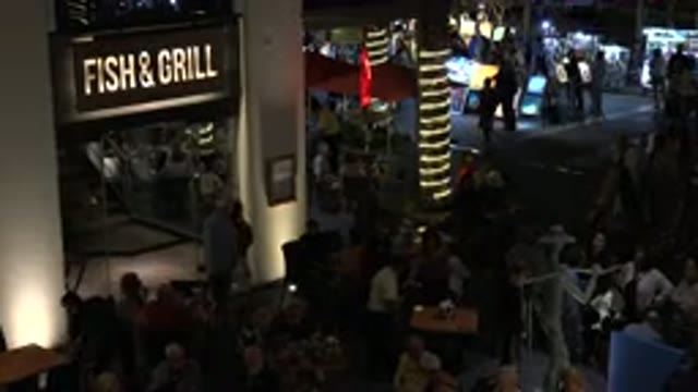 LOS CABOS MEXICO-2019: Busy Street Road Side Cafeteria People Eating Dishes