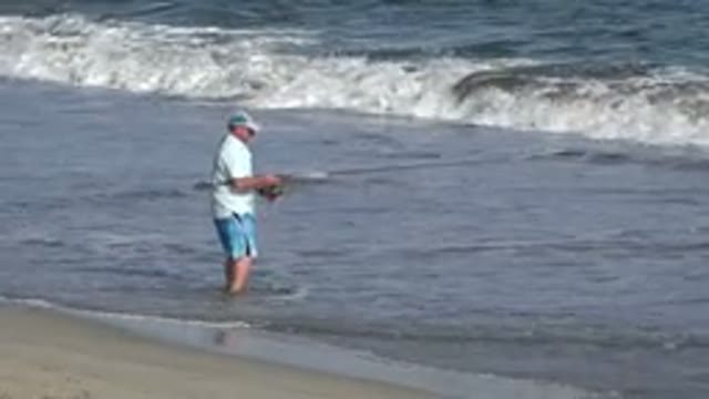 LOS CABOS MEXICO-2019: An Old Man Is Going Fishing At The Beach Lonely With A