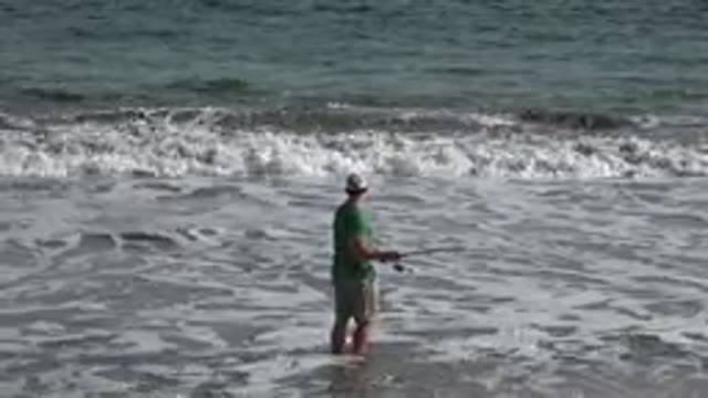 LOS CABOS MEXICO-2019: A Man Fishing On The Tidy Beach