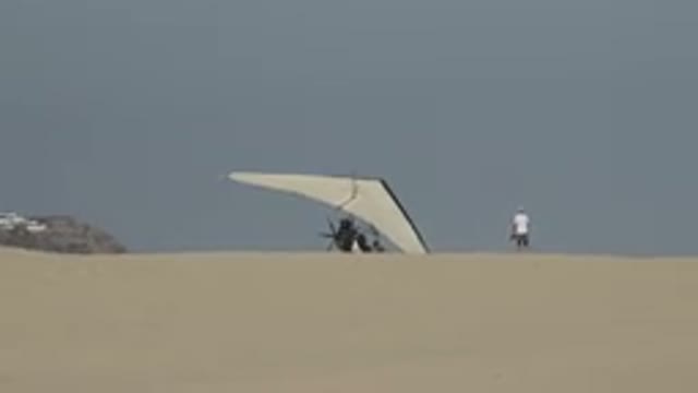 LOS CABOS MEXICO-2019: Windsurfing Device Prepares to Launch Off a Dune