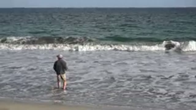 LOS CABOS MEXICO-2019: Man Fishing On Sea Shore