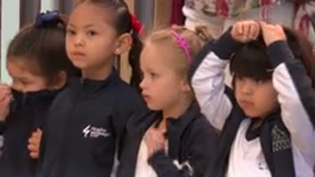 SAN JOSE DEL CABO MEXICO-2019: Four Young School Age Girls Fidgeting While Waiting
