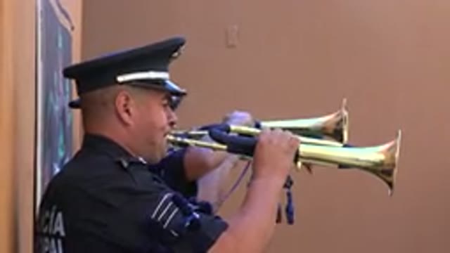 SAN JOSE DEL CABO MEXICO-2019: Military Man Playing Trumpet in Afternoon