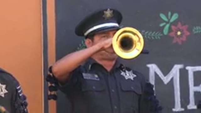 SAN JOSE DEL CABO MEXICO-2019: A Police Man Playing His Music Instrument On The
