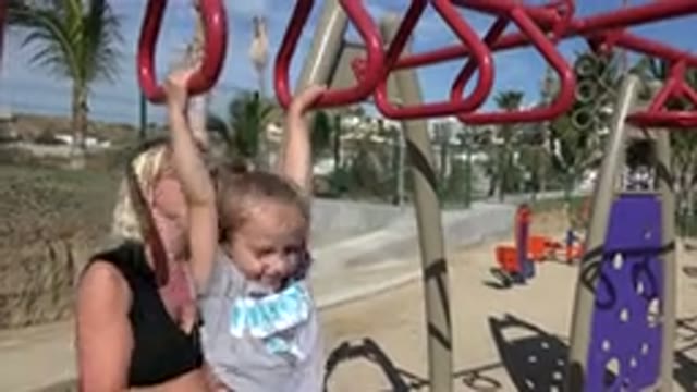 SAN JOSE DEL CABO MEXICO-2019: Child And Woman Having Fun On The Playground
