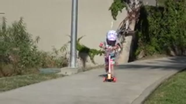 SAN JOSE DEL CABO MEXICO-2019: Kid Learning How To Ride A Tricycle By Taking All