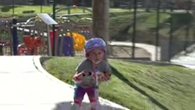 SAN JOSE DEL CABO MEXICO-2019: Little Girl Learns To Properly Control Her Scooter