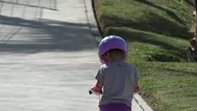 SAN JOSE DEL CABO MEXICO-2019: Little Girl Walking On The Park With Her Scooter