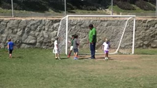 SAN JOSE DEL CABO MEXICO-2019: Children Talk To A Guide Before Playing Soccer