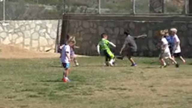 SAN JOSE DEL CABO MEXICO-2019: Little Girl Cleans The Foot Of Her Shoes On The Grass