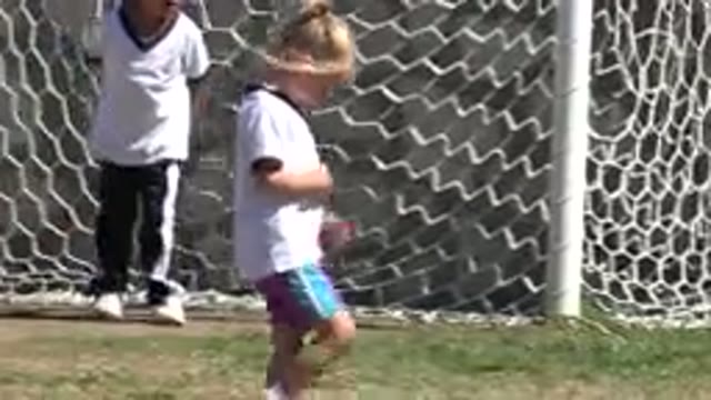 SAN JOSE DEL CABO MEXICO-2019: A Girl Child Walking In A Football Field Game And