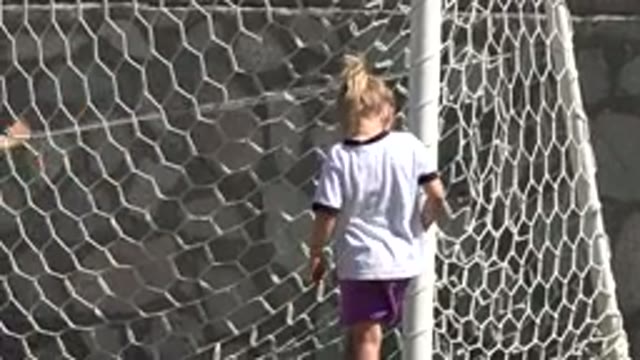 SAN JOSE DEL CABO MEXICO-2019: Little Girl Walking Near The Soccer Net