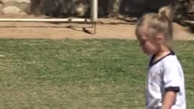 SAN JOSE DEL CABO MEXICO-2019: A Little Girl Wearing White Jersey Walking On A