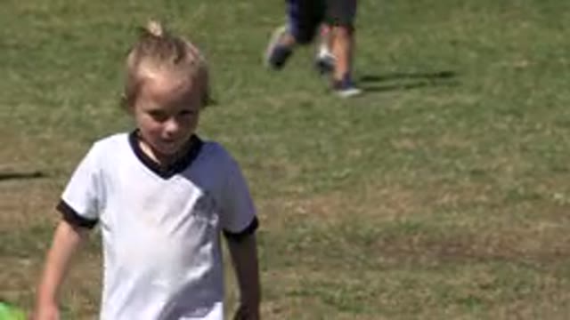 SAN JOSE DEL CABO MEXICO-2019: A Young Girl Practicing Soccer Outdoors
