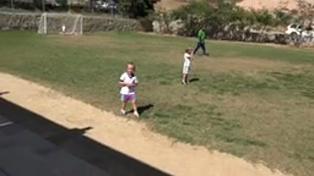 SAN JOSE DEL CABO MEXICO-2019: Girl Children Practicing Soccer on Grass and Dirt Field