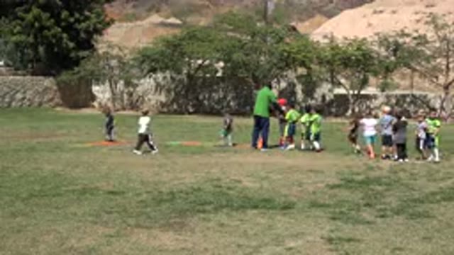 SAN JOSE DEL CABO MEXICO-2019: View Of Kids Running Through Green And Orange