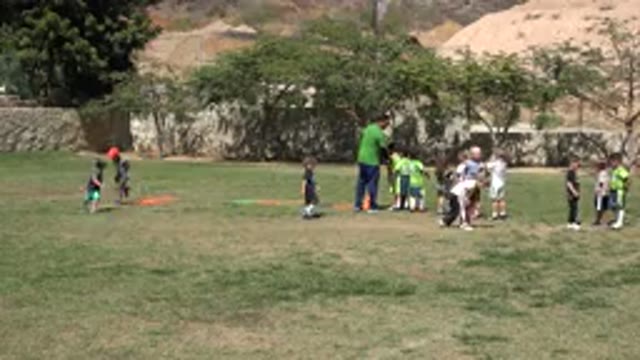 SAN JOSE DEL CABO MEXICO-2019: Kids Running Around The Soccer Field Before Practice