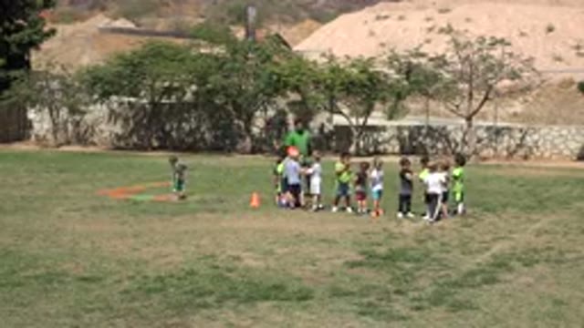 SAN JOSE DEL CABO MEXICO-2019: Children In Park Consult With Their Soccer Coach