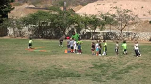 SAN JOSE DEL CABO MEXICO-2019: A Team Of Kids Training With Their Coach In The