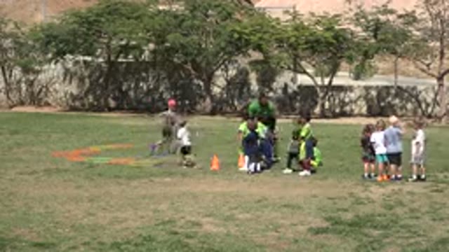 SAN JOSE DEL CABO MEXICO-2019: View Of Kids Running On Green Field On A Bright