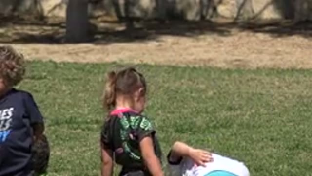 SAN JOSE DEL CABO MEXICO-2019: Children Playing Outside In The Grass On A