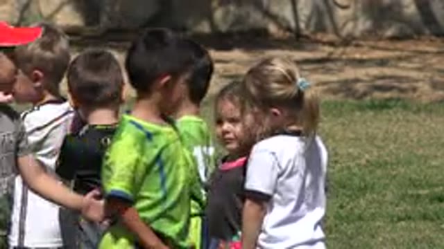 SAN JOSE DEL CABO MEXICO-2019: Children Line Up Outside While One Child