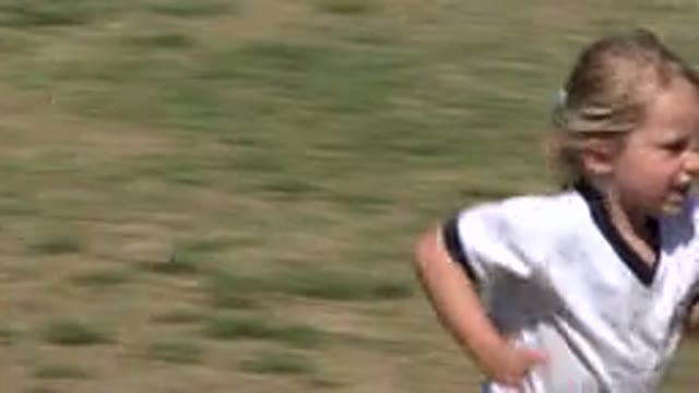 SAN JOSE DEL CABO MEXICO-2019: Happy Kid Running Across The Football Field After Scoring Goal