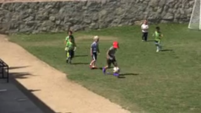 SAN JOSE DEL CABO MEXICO-2019: Small Children Play Soccer On A Field Wearing