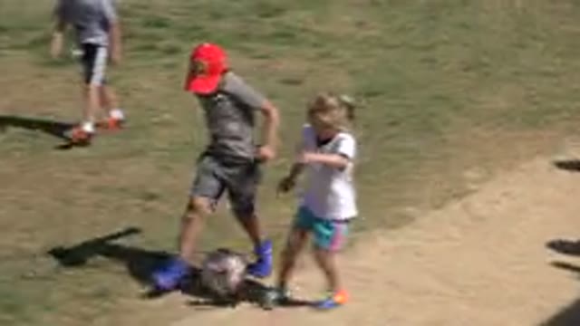 SAN JOSE DEL CABO MEXICO-2019: Children Kicking A Soccer Ball Playing Together