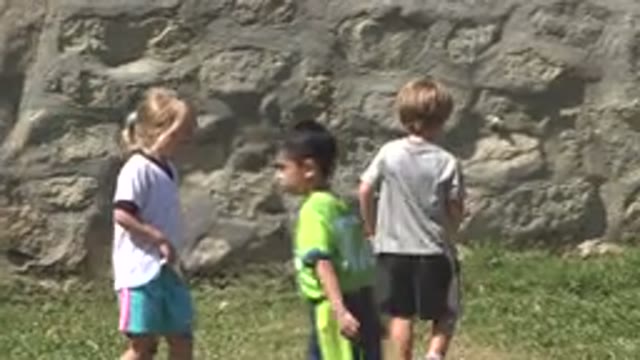 SAN JOSE DEL CABO MEXICO-2019: Three Children Wearing Short Sleeves Walking
