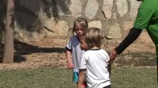SAN JOSE DEL CABO MEXICO-2019: Blonde Children Playing Together On The Grass