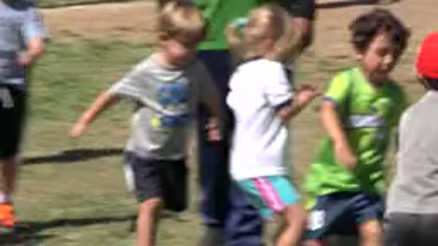 SAN JOSE DEL CABO MEXICO-2019: Boys And Girls Running Around With A Football In