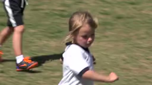 SAN JOSE DEL CABO MEXICO-2019: Young Girl Running Along A Field With Other Children