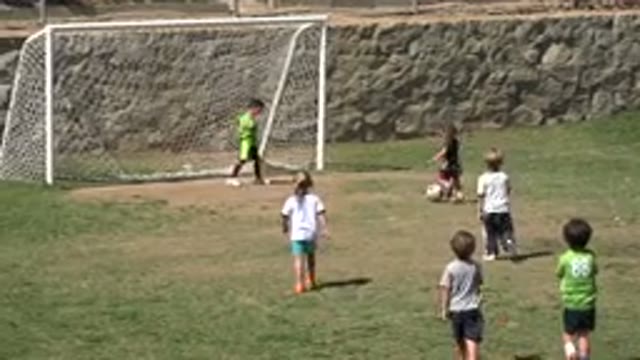 SAN JOSE DEL CABO MEXICO-2019: Little Girl Facing A Keeper Trying To Score A Goal