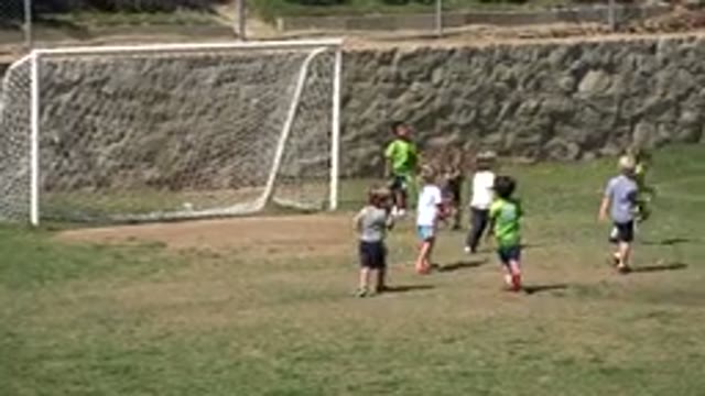 SAN JOSE DEL CABO MEXICO-2019: Young Children Playing Soccer In Front Of A Rock