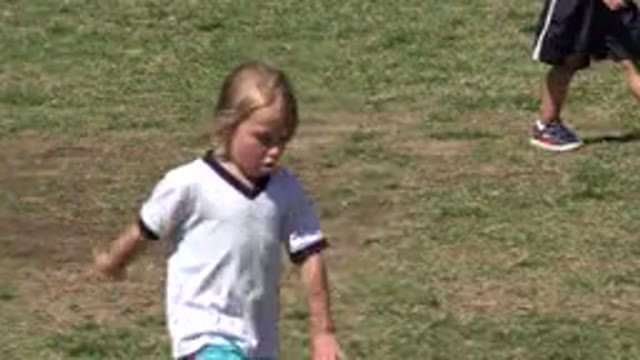 SAN JOSE DEL CABO MEXICO-2019: Children Are Walking In The Grassy Court Wearing Sports Jerseys