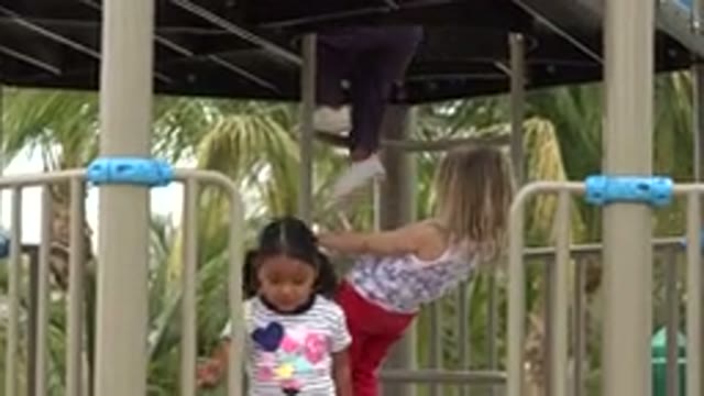 SAN JOSE DEL CABO MEXICO-2019: Group Of Friends Climbing On Playground