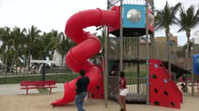 SAN JOSE DEL CABO MEXICO-2019: Big Recreation Playground With Parents Watching A