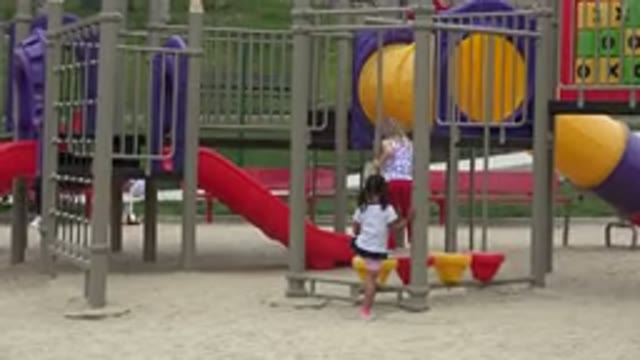 SAN JOSE DEL CABO MEXICO-2019: Beautiful Colorful Park With Two Small Children Playing