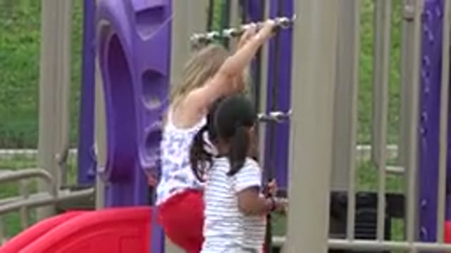 SAN JOSE DEL CABO MEXICO-2019: Happy Kids Climbing Toy In Park During A Sunny Day