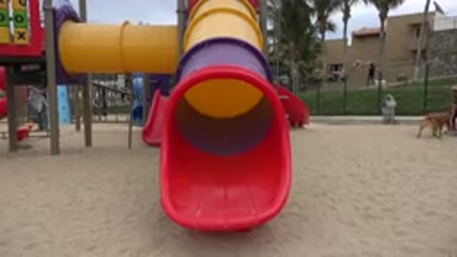SAN JOSE DEL CABO MEXICO-2019: Colorful Slide In A Park With Many Children