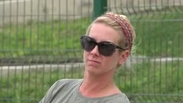 SAN JOSE DEL CABO MEXICO-2019: Blonde Woman With Sunglasses And A Red Scarf On